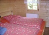 Schlafzimmer im Blockhaus